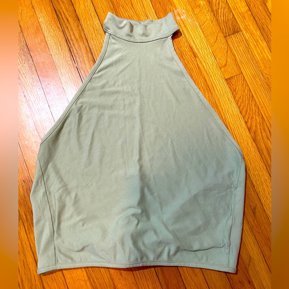 FIVE Activewear Halter. Ties in in back. Size Child XL. Excellent condition.